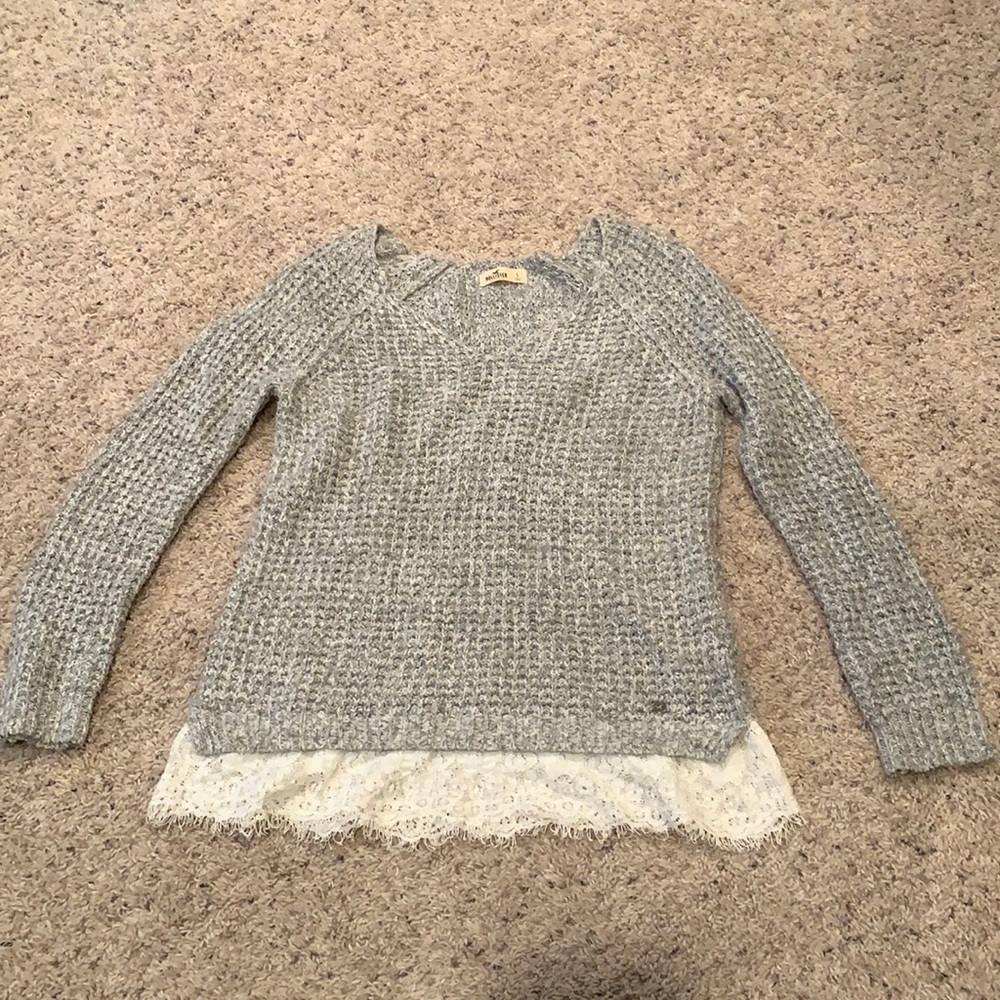 Light grey v-neck Hollister sweater with lace. Good condition.